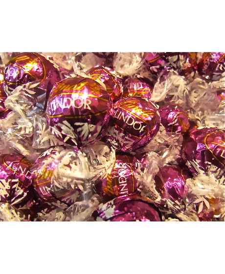 Vendita online cioccolatini Lindor viola alla Mandorla, Lindt & Sprüngli a €32,00 al Kg. Shop on-line cioccolatini Lindor alle m