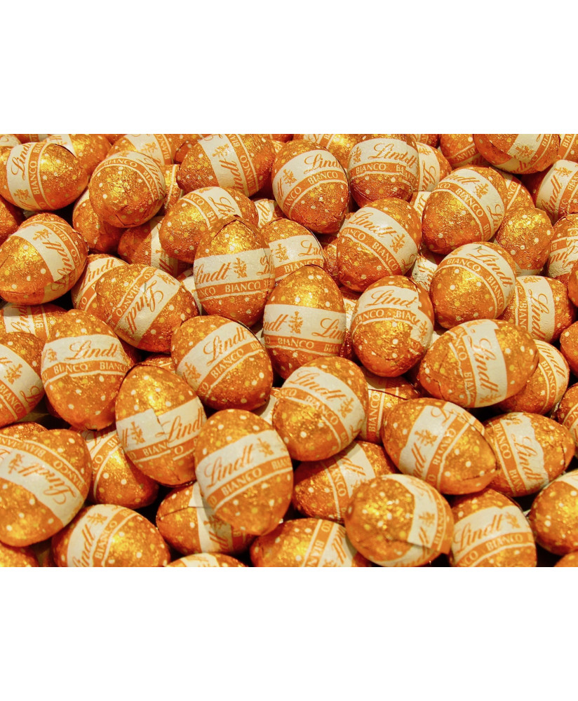 Vendita online Ovetti di Pasqua Lindt di cioccolato bianco, Lindt & Sprüngli a €30.00 al Kg. Shop on-line ovine bianche Lindor.