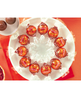 Vendita online cioccolatini Lindor arancioni, gusto arancia, cioccolato fondente e arancio, Lindt & Sprüngli a €32,00 al Kg. Sho