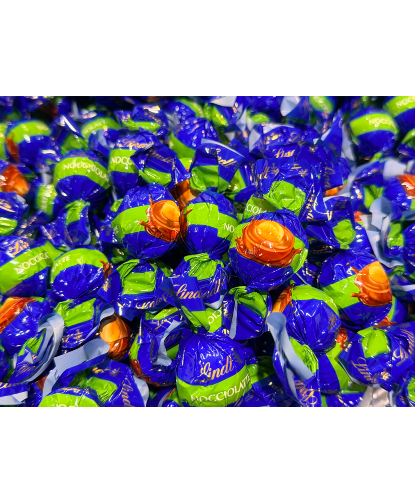 Vendita online cioccolatini Lindor Nocciolatte, al latte con nocciola intera. Lindt & Sprüngli a €32,00 al Kg. Shop on-line cioc